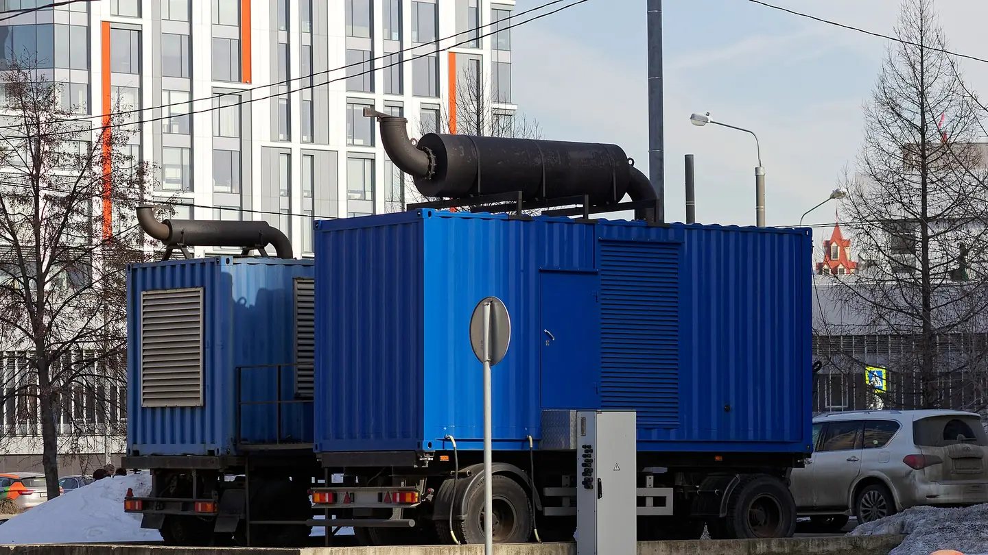 Outdoor generator equipment installed beneath steel weather canopies